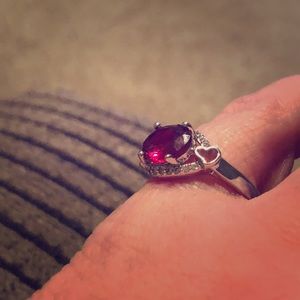 Red ruby looking solitaire ring